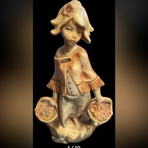 Vintage depose girl holding flowers figurine